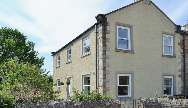 A pretty stone cottage in the conservation village of Redmire.