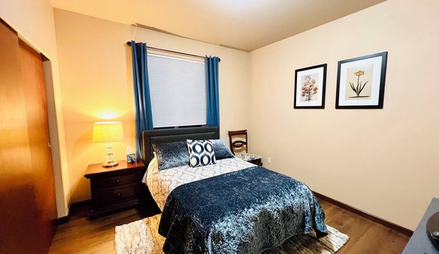 A private bedroom with AC in a quiet neighborhood