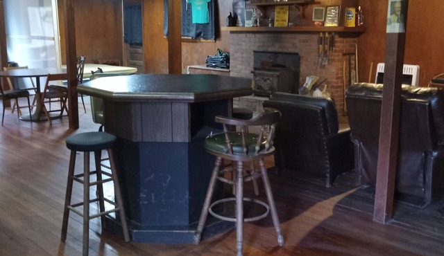 A private camp situated on 60 acres. Purple paint for hikers to see huge rocks.