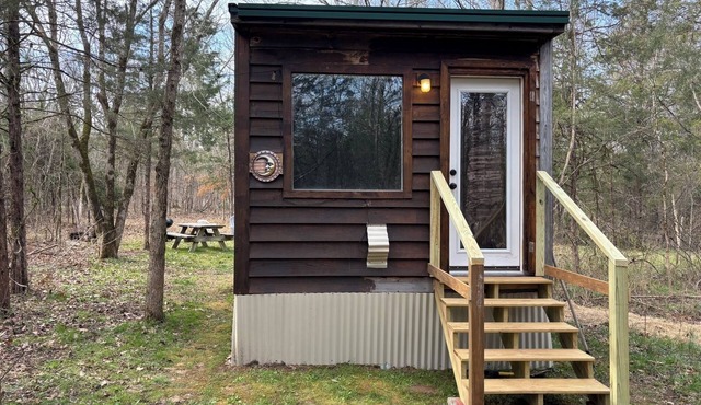 A private tiny guest house tucked away on a quiet piece of country property.