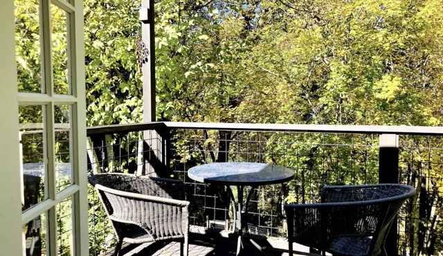 A quiet, downtown retreat surrounded by natural beauty, overlooking Deer Creek.