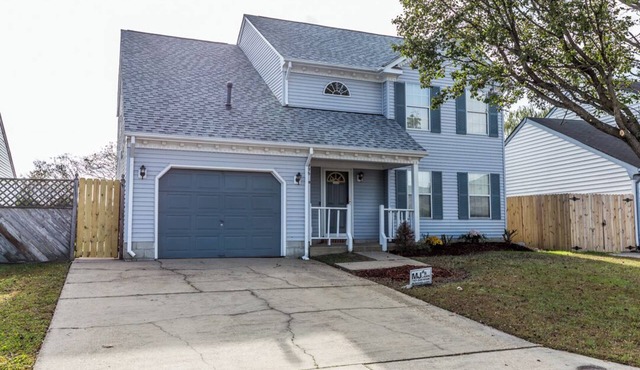 A quiet lakeside home for family, business, or both to relax or be productive.