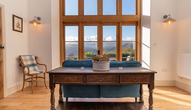 A recently converted barn that sits high above the beautiful Conwy Valley.