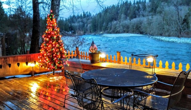 A river retreat with breath taking views of river and mountains from a hot tub