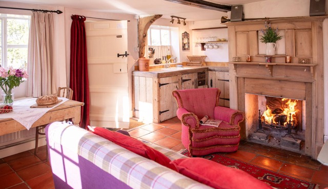 A romantic little Farm cottage with a roaring fire. Ideal for dog owners.