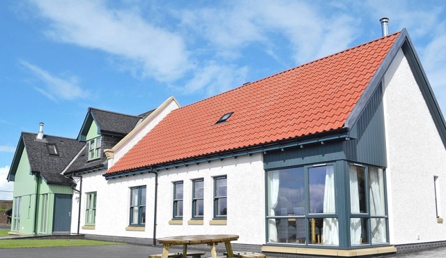 A rural property based on a working farm with wood burner.
