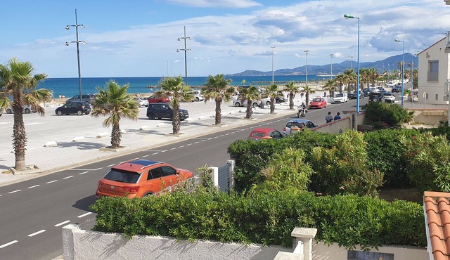A seafront dream with garden and private parking.