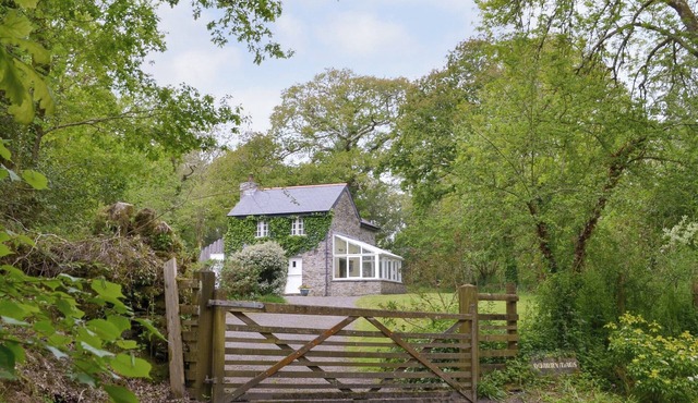 A secluded cottage surrounded by woodland and boasting many original features.
