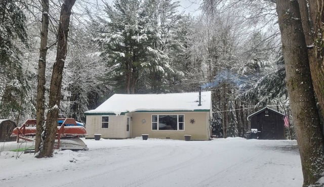 A short snowmobile ride to the trails or cozy stay by the fire with a view