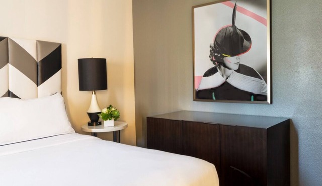 A Sophisticated Suite! Four Units with Furnished Living, Rooftop Pool, Balcony!