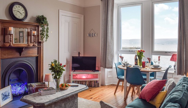 A spacious apartment with stunning views over Gare Loch.