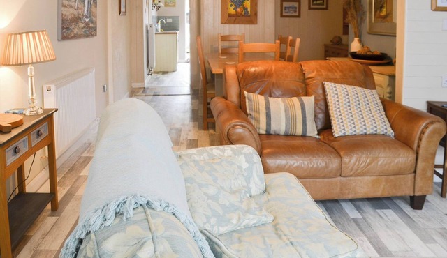 A spacious cottage with three bedrooms and two bathrooms making it ideal for family and friends.