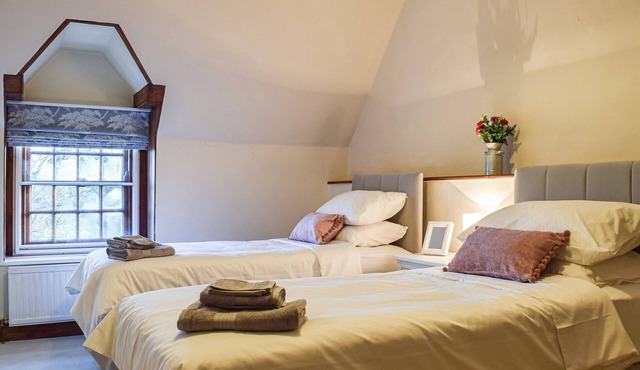 A spacious country retreat surrounded by open fields and miles of footpaths from the doorstep.