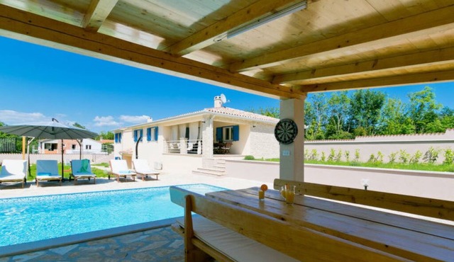 A spacious four-bedroom villa with sauna and private pool