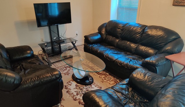 A spacious furnished 1bdr basement apartment.