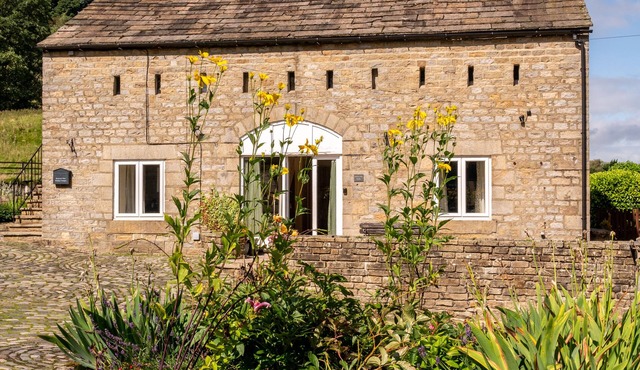 A spacious property with a focus on socialising with far reaching tranquil views of the dales