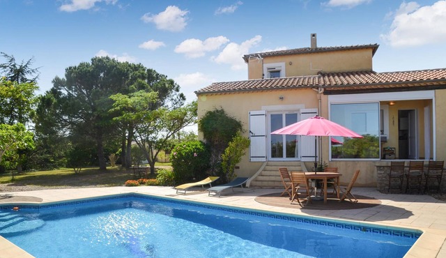 A spacious vacation home with pool located in a quiet area.