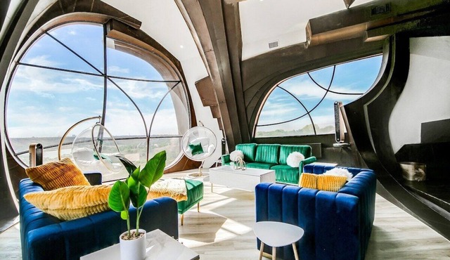 A stay like no other—inside an iconic steel sculpture with panoramic canyon and lake views.
