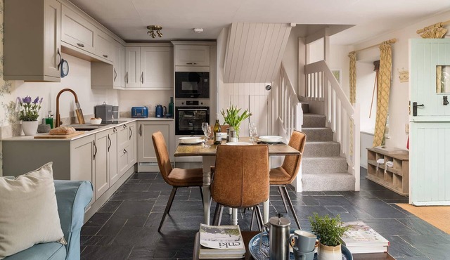 A stone cottage that sleeps 3 guests in 1 bedroom