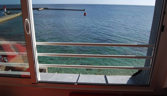 A studio located in a house directly on the beach in a stunning maritime site