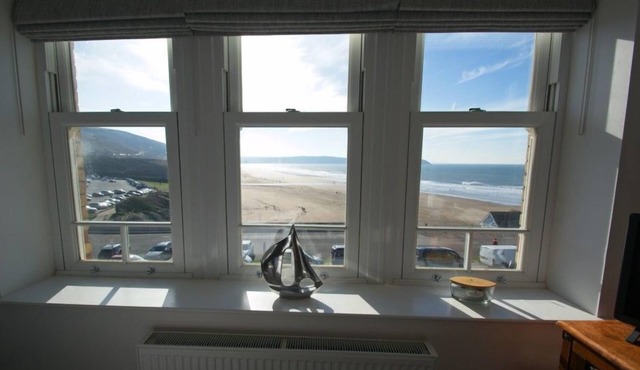 A stunning 3 bedroom, 3 bathroom 1st floor apartment with superb seaviews opposite main beach!