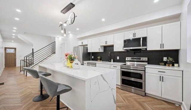 A stunning 5 bedroom 3 bath home offering modern luxury and thoughtful design.