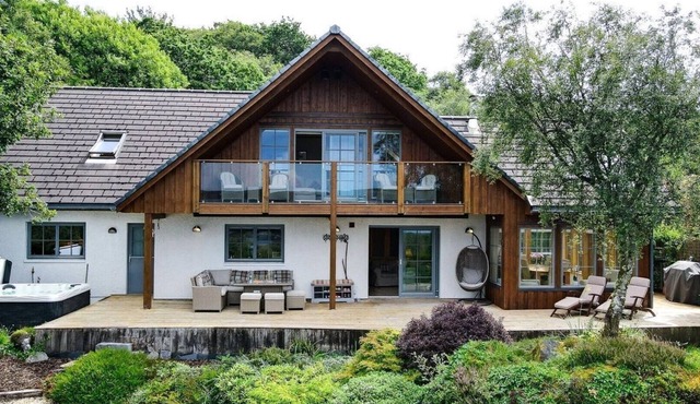 A stunning contemporary villa with spectacular sea views, hot tub and BBQ Hut