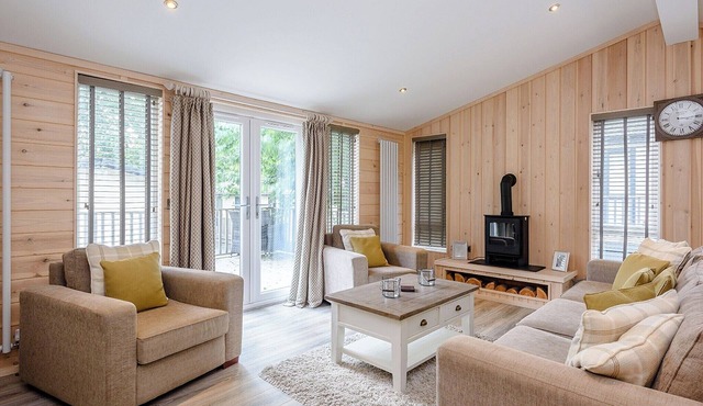 A stunning lodge with one master king-size with en suite shower room.