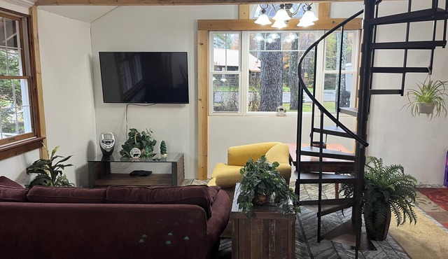 A stylish Adirondack Log Cabin located along side the NYS Hiking trail System!