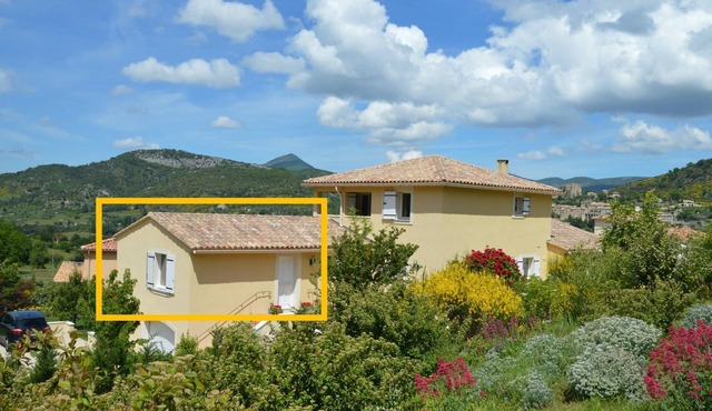 A sunny living room with a loggia and a beautiful view of Mont Ventoux