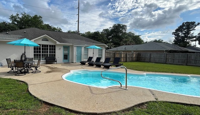 A Taste of ParadisenSpacious 4BR/3BA retreat with a private pool