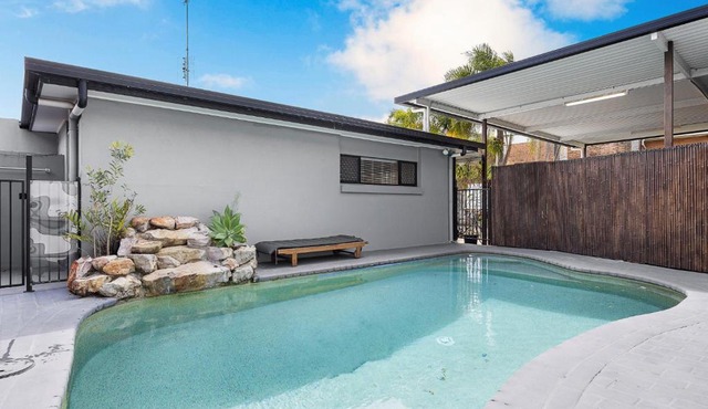 A Tranquil Sunshine Escape with Pool and Deck