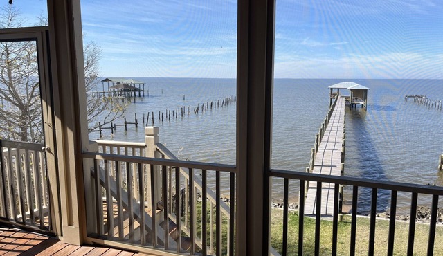 A tranquil waterfront escape with breathtaking sunset views and a private pier