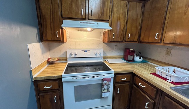 A travelers home, community pool, center location