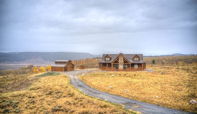 A True Montana Cabin with Sweeping Views of the Mountains and the Madison River.