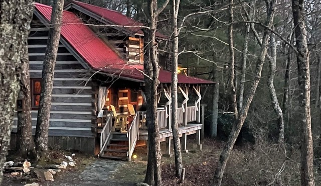 A Unique Bed and Breakfast.Log Cabins, with Hot Tubs and Breakfast Delivered Each Morning :)