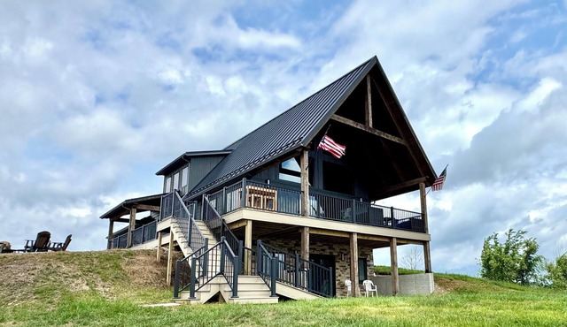 A unique modern farmhouse nestled on 67 rolling acres w/stunning views.