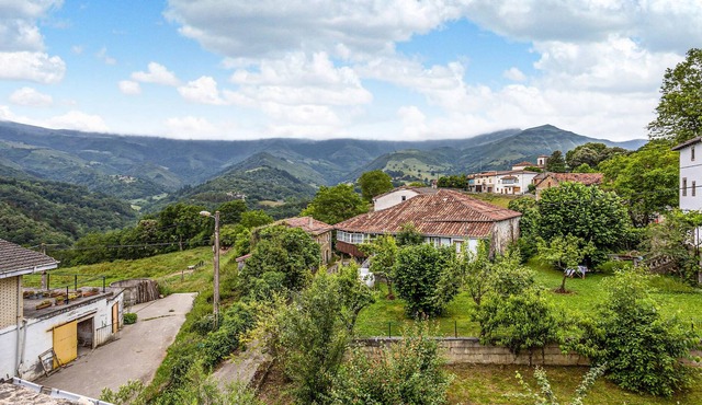 A vacation home in an idyllic area with a flowering garden.