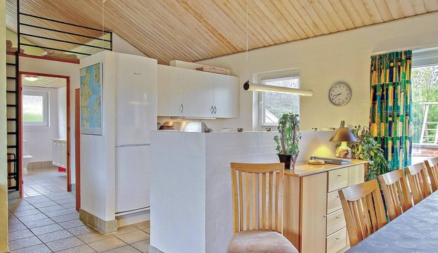 A very cozy cottage with swimming pool, located near a child-friendly beach with shallow water.