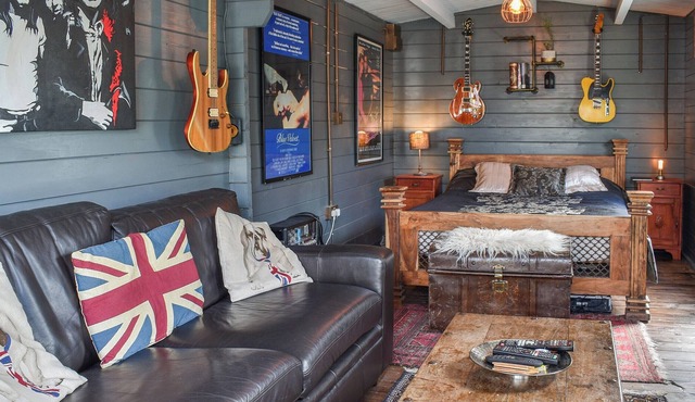 A very unique and quirky cottage with a massive split-level garden with mixed seating areas and shad