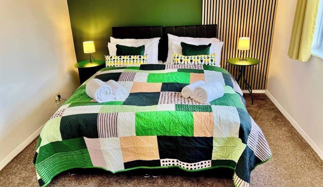 A vibrant 3-bedroom house with ample parking