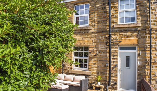 A wonderful stone built cottage located on a quiet row in Clayton West.
