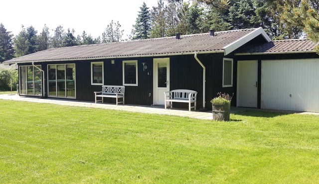 A wooden house on the beautiful West Coast with the width beautiful beaches.