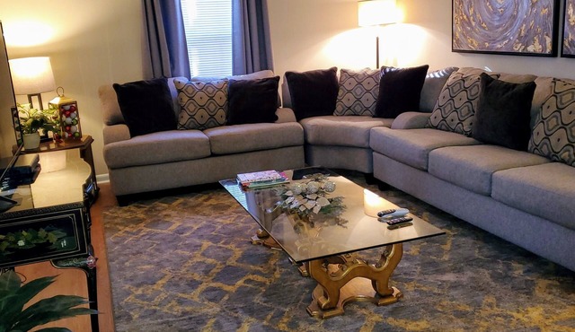 "Abbie's Place: Spacious 4BR Sanctuary with Sunroom and Private Backyard"