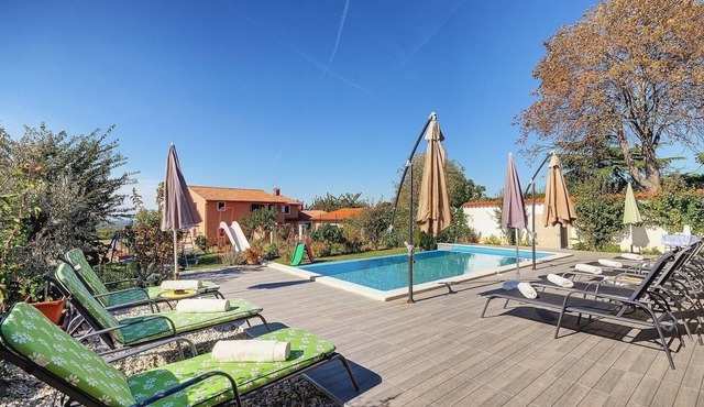 Above the Limfjord lies this Apartment with pool