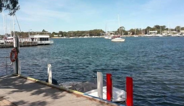 Absolute water frontage with river and jetty at front door and Lake King to rear
