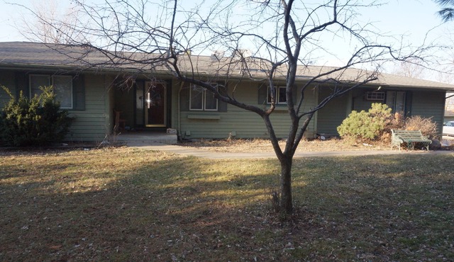 Acreage InTown 4 BR, 2 Bath 3,300 sq ft half house option with gymnasium.