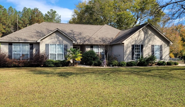 Acreage with pool in town