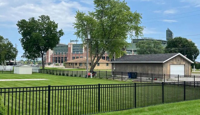 Across the street from Lambeau! Remodeled 5 bedroom house with big backyard!