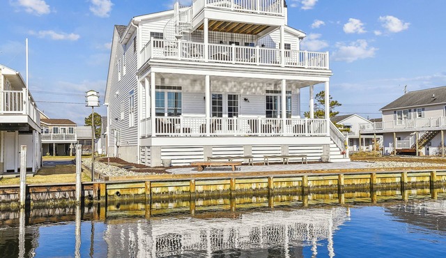 Activities included up to $300 FREE PER WEEK! Exceptional waterfront custom vacation home is located on a canal in family friendly Fenwick Island